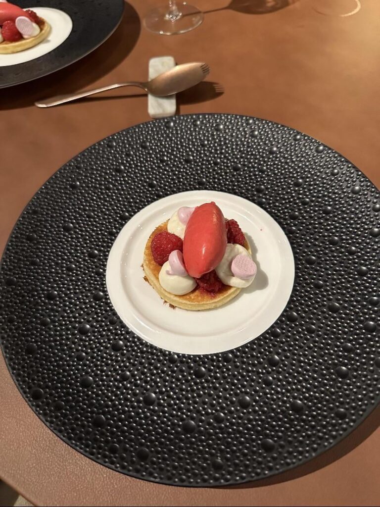 Traditional Norwegian svele (pancake) with raspberry sorbet
