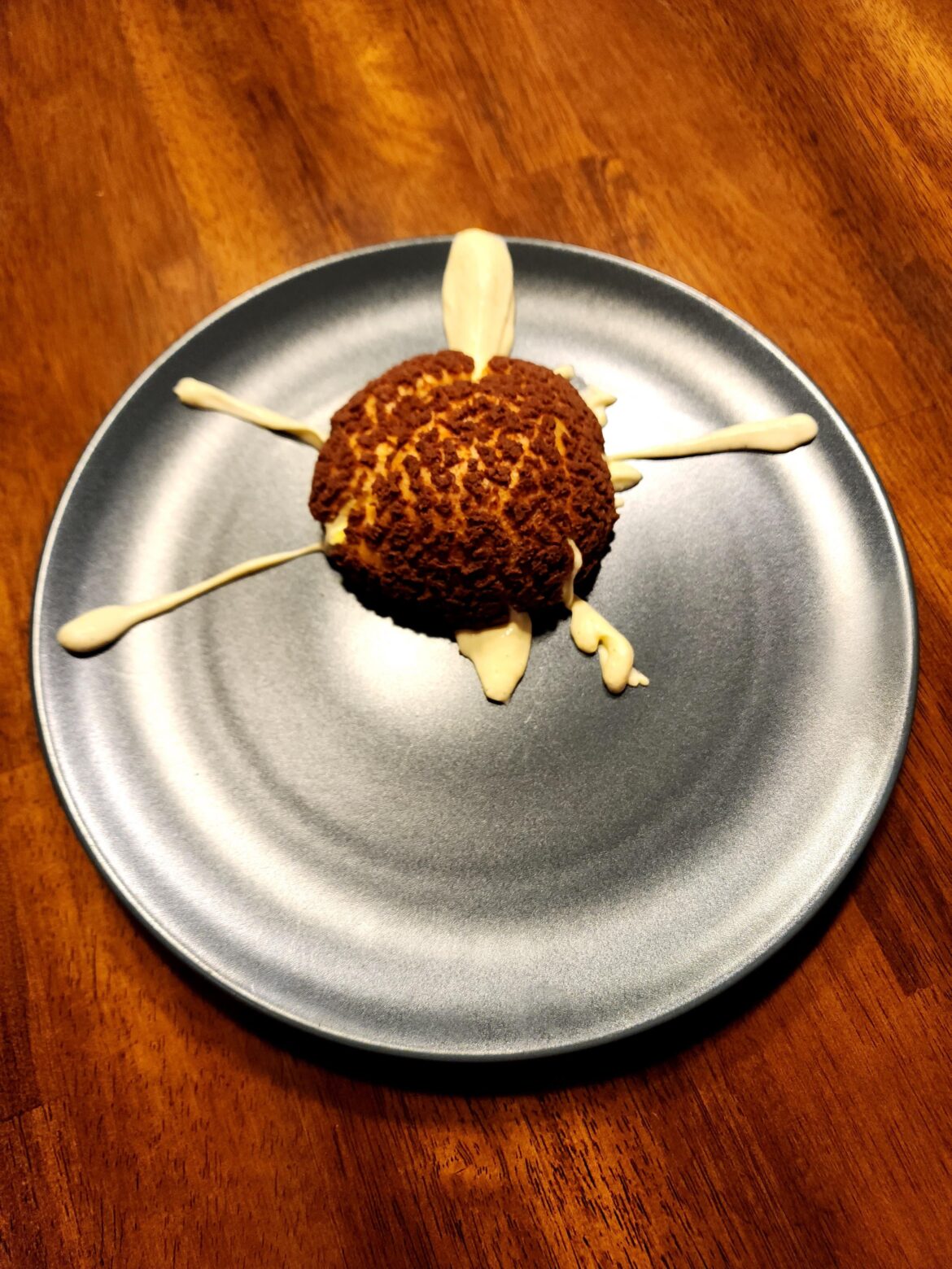 Cocoa Craquelin Profiteroles with Creme Patisserie.