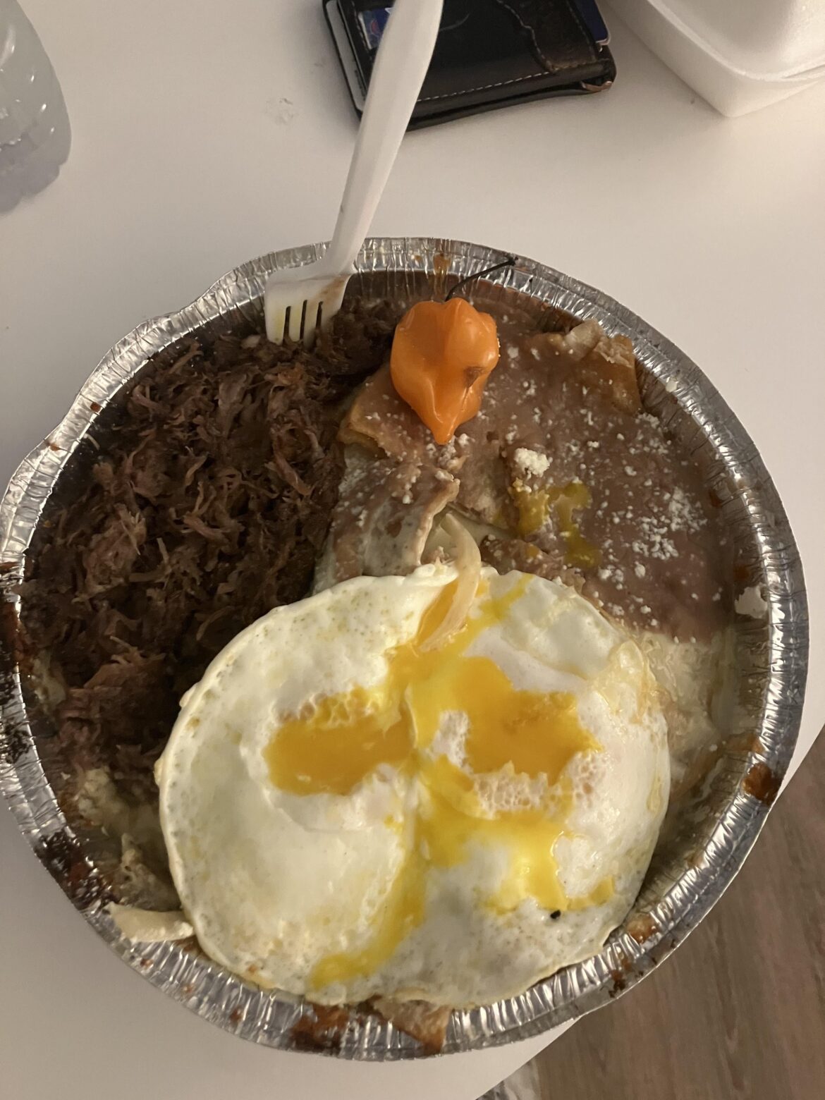 Los Chilakillers - poblano & habanero chilaquiles w/ barbacoa & eggs!