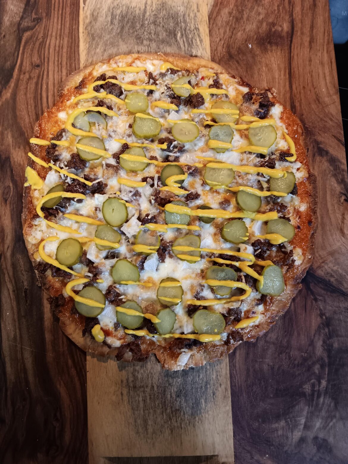 SO has deemed this despicable. Thin crust: Mayo + Ketchup sauce base, Beef crumble + MSG, Pepper jack cheese. BAKE. top with pickles, then mustard