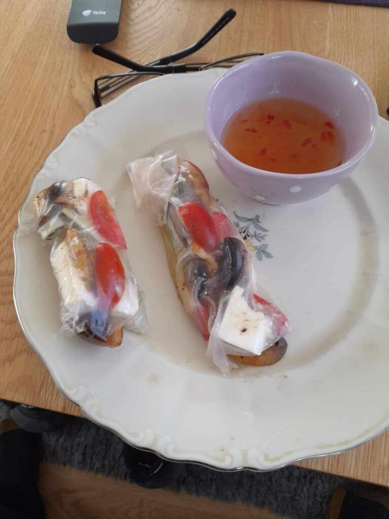 Feta cheese, tomato, and mushroom “spring rolls” with sweet chili sauce.