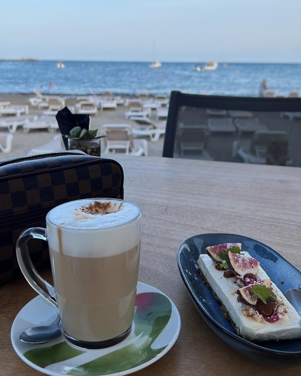 A delicious coffee while I look at the beautiful background. Spain