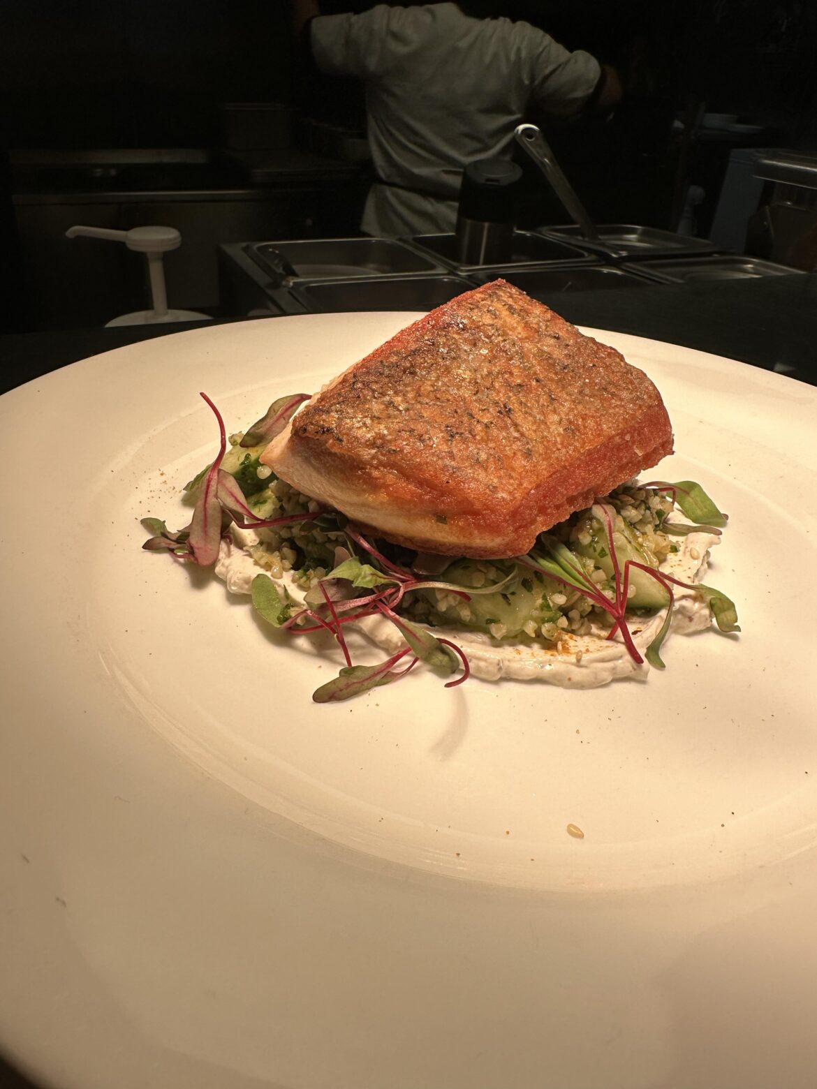Salmon with labneh, bulgur salad and lightly pickled cucumbers