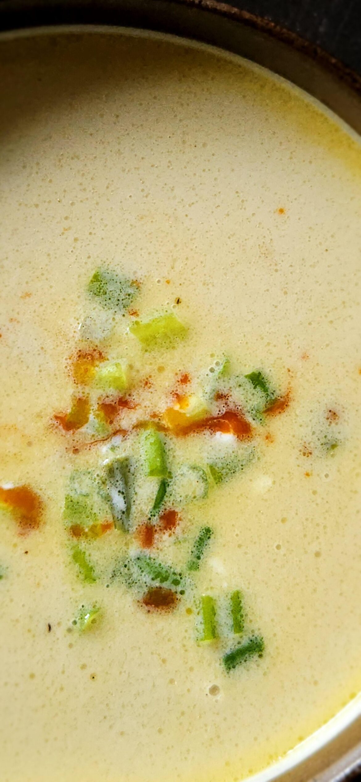 [Homemade] Loaded baked potato soup with bacon, cheddar, sour cream, scallions, and hot sauce