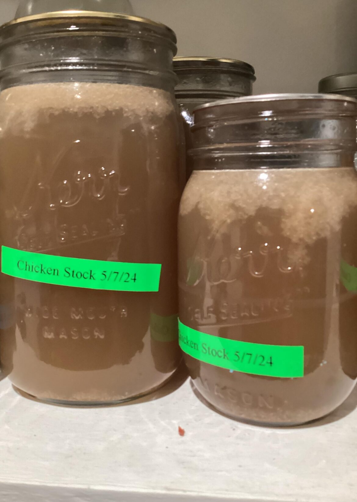 After pulling from pressure cooker - do you retighten the lids?