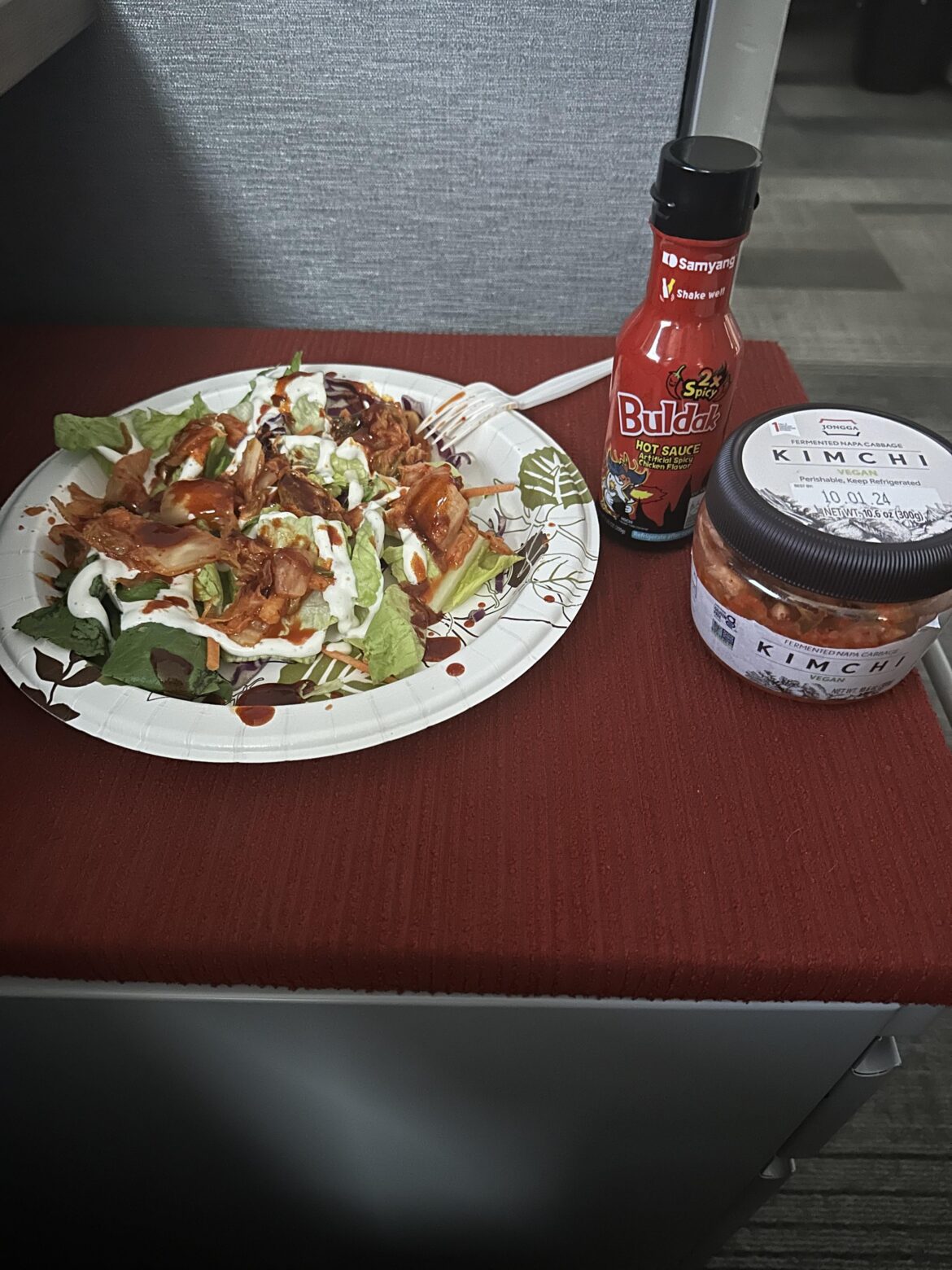 The proper way to eat a salad is to add Kimchi, and Buldak.