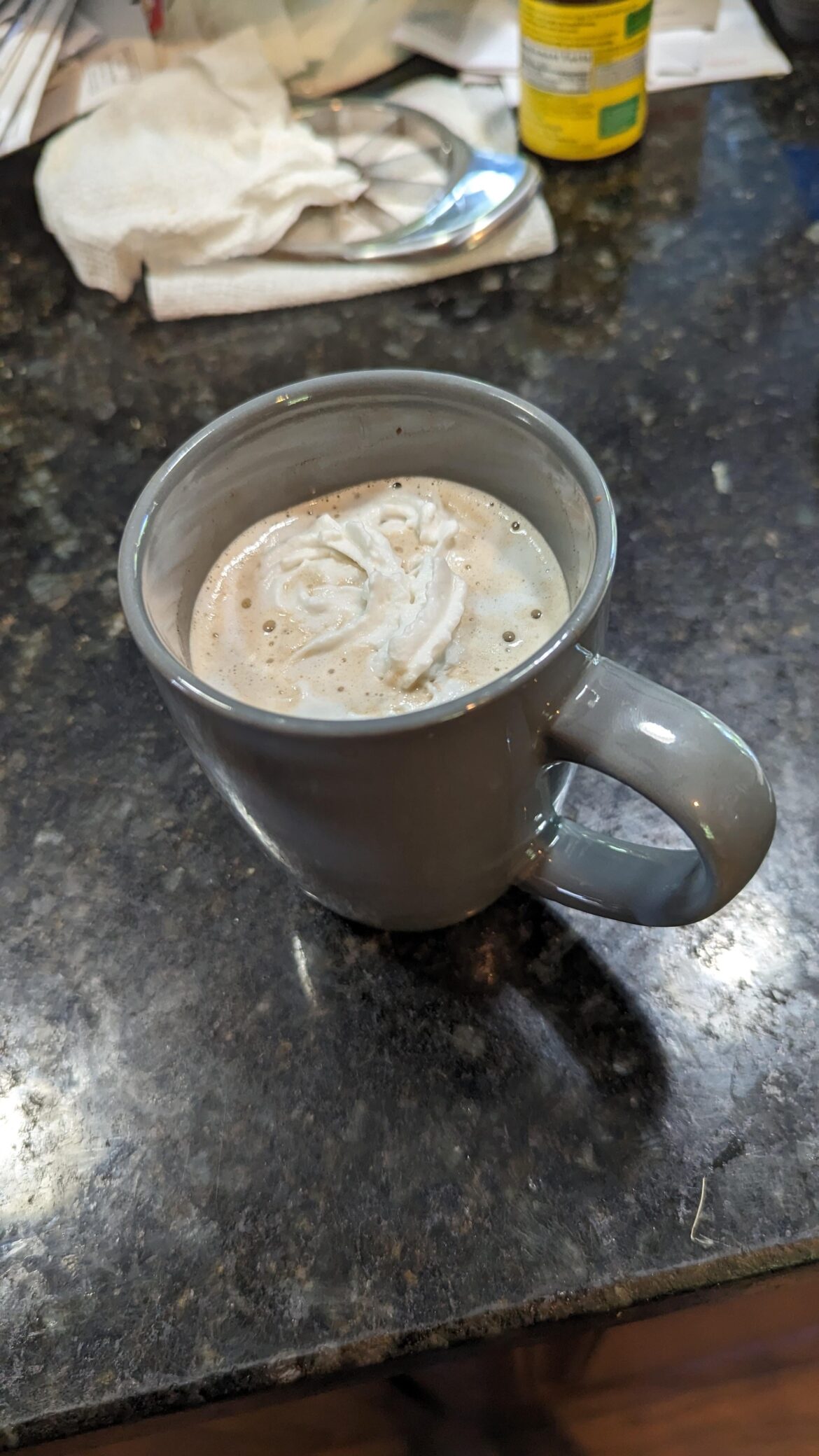 Coffee with some whipped cream on top