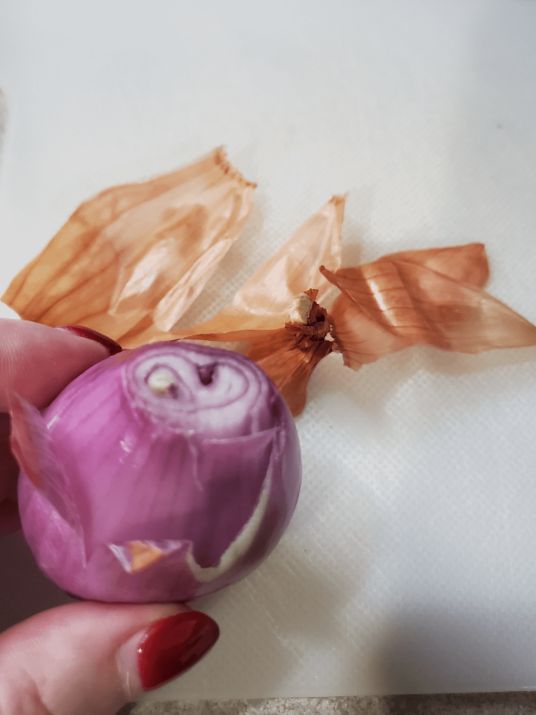 Help! I've never cooked with a shallot! Did I take off enough of the layer? Is the rest of it edible?