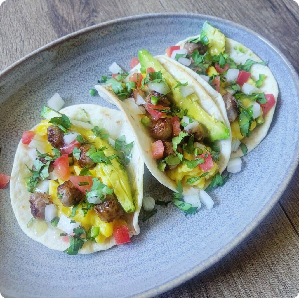 Breakfast tacos with soft scrambled eggs.
