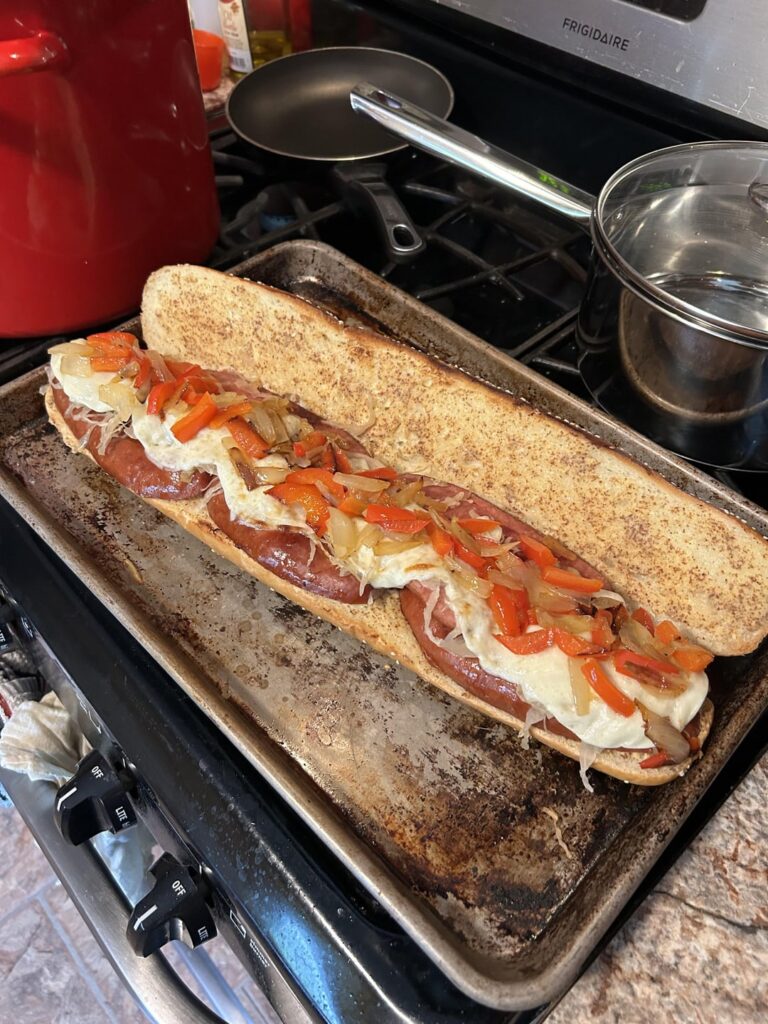 Home Baked Sub Roll with Kielbasa, Sauerkraut, Swiss/Provolone, Peppers/Onions and some Spicy Brown Mustard