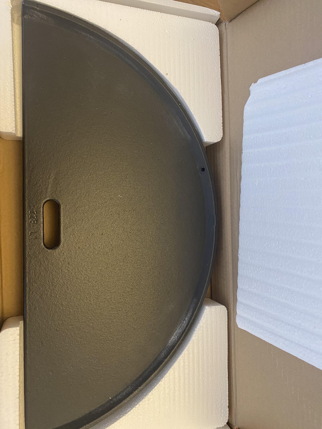 Hole in cast iron half moon? Dining and Cooking