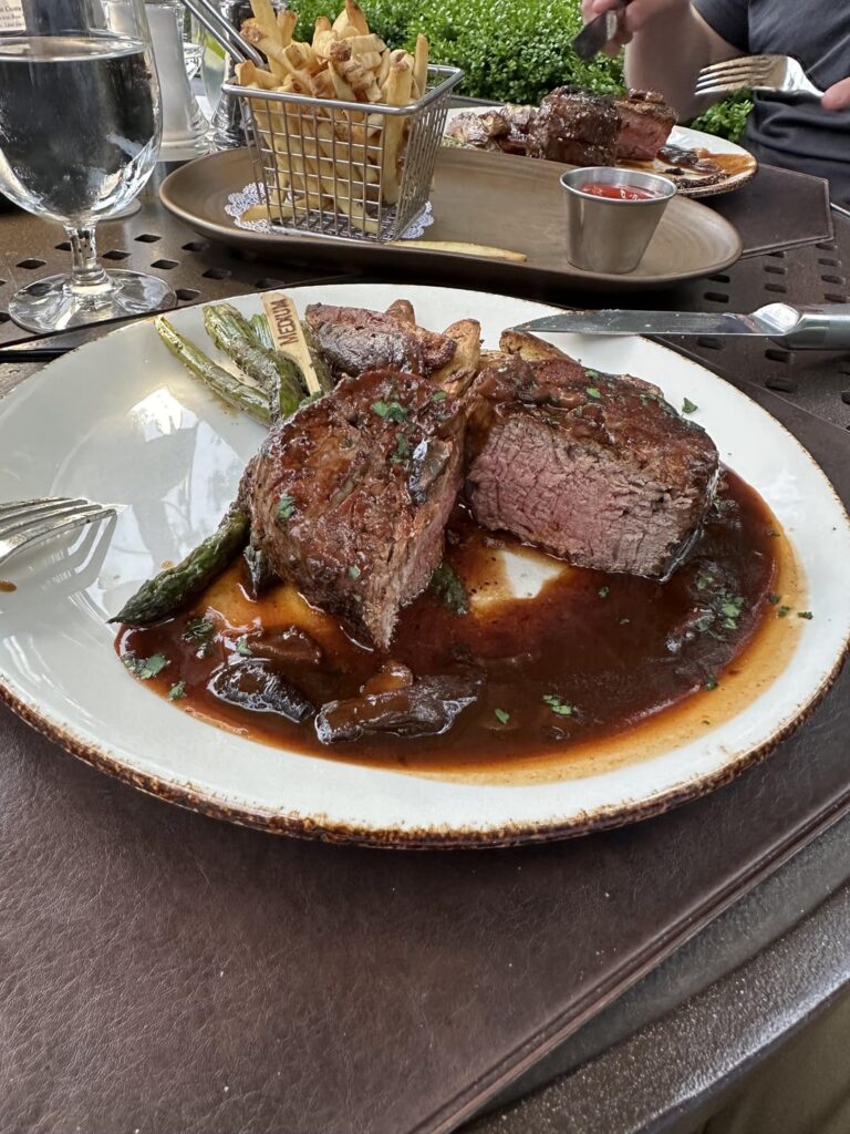 [i ate] 10oz filet mignon with cherry pepper reduction, asparagus and fingerling potato. Paired with a Makers Mark Manhattan.