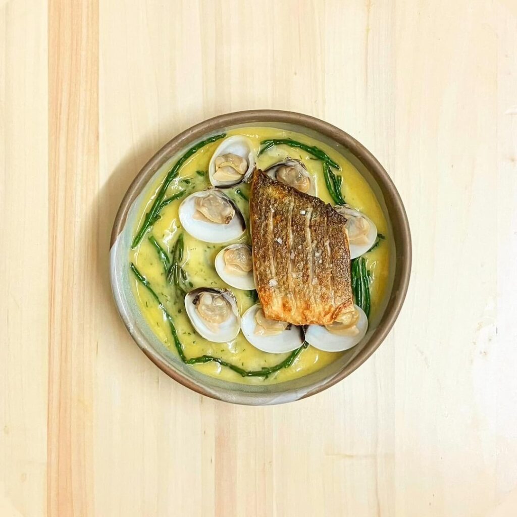 Sea bass, clams, samphire, lemon beurre blanc