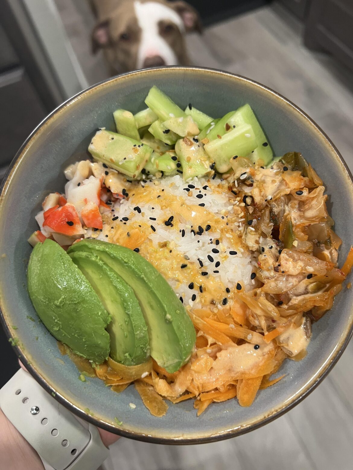 Pretty proud of this quick dinner tonight— Crab poke-style bowls with cucumber, carrot, avocado, kimchi, homemade spicy mayo, and sesame seeds 😋