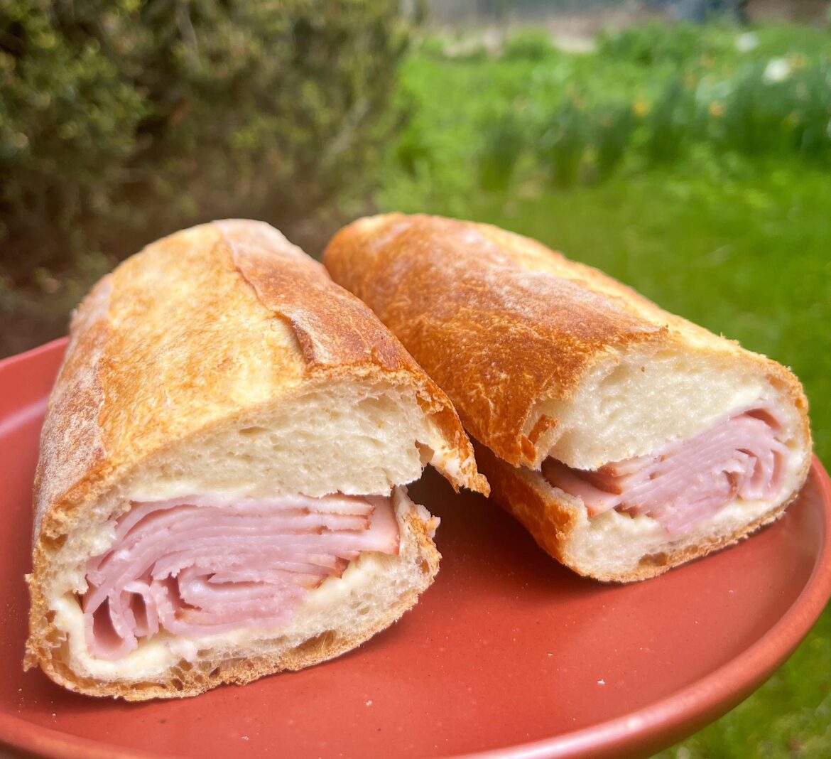 Jambon-beurre on a fresh, crackly baguette in the backyard.