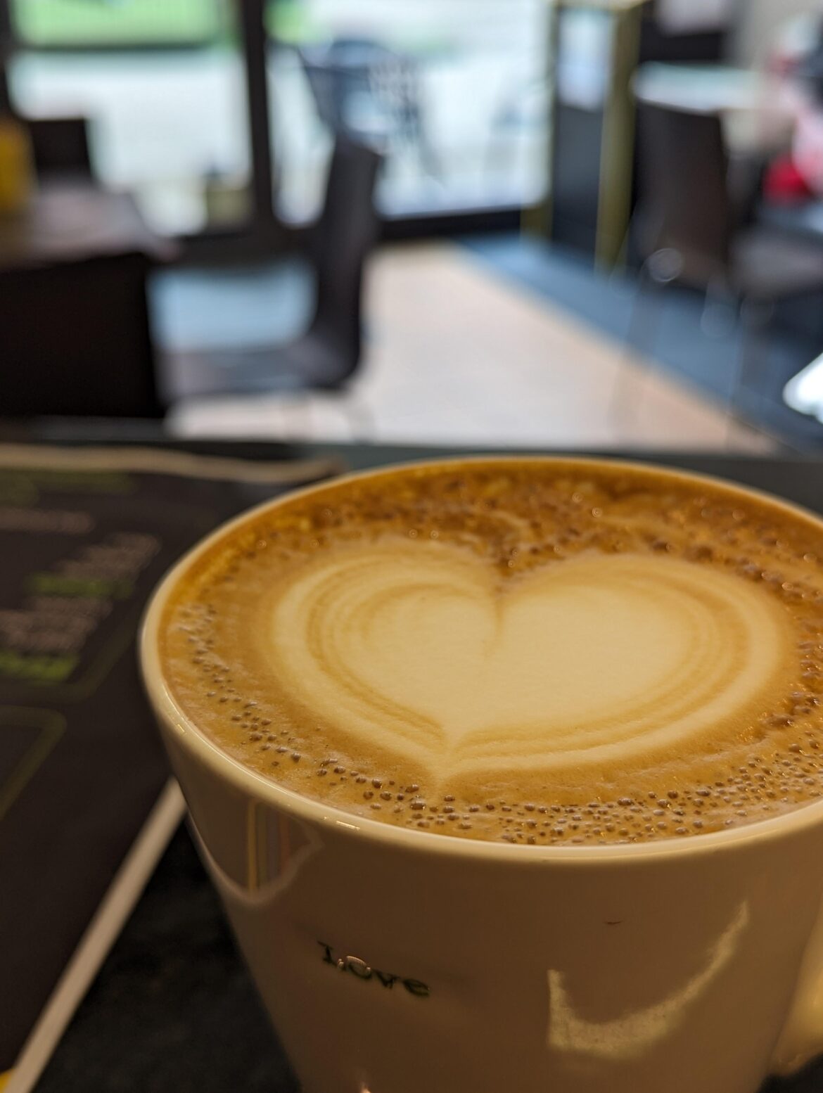 Am I right in thinking the bubbles forming on my latte is remnants of degassing from fresh coffee?