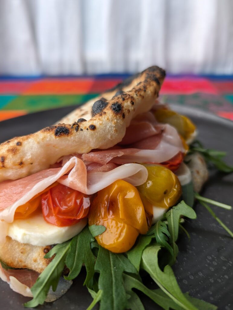 Panuozzo. Not exactly pizza but it's the same dough and was baked in the same way as Neapolitan pizza.