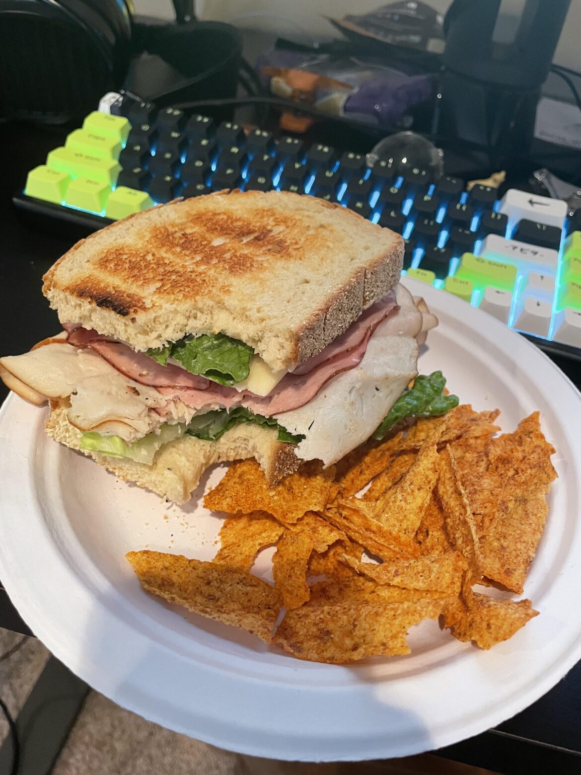 Ham and turkey with Vermont white cheddar, tons of lettuce, a homemade sauce with mayo, dijon mustard, garlic, and onion powder, on toasted sourdough. Phenomenal.