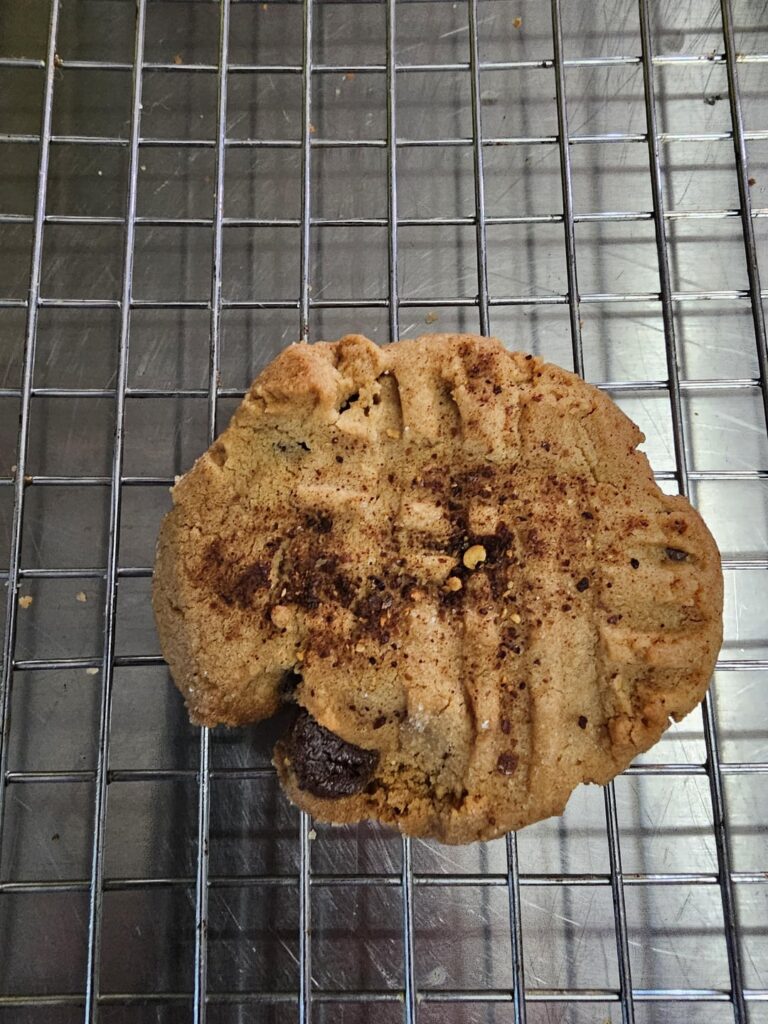 Homemade PB cookies with chocolate chips, ground reaper, cayenne and jalepeno.