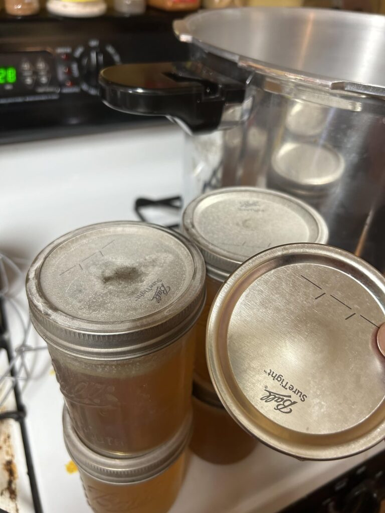 What is this white residue on my jars after pressure canning stock?