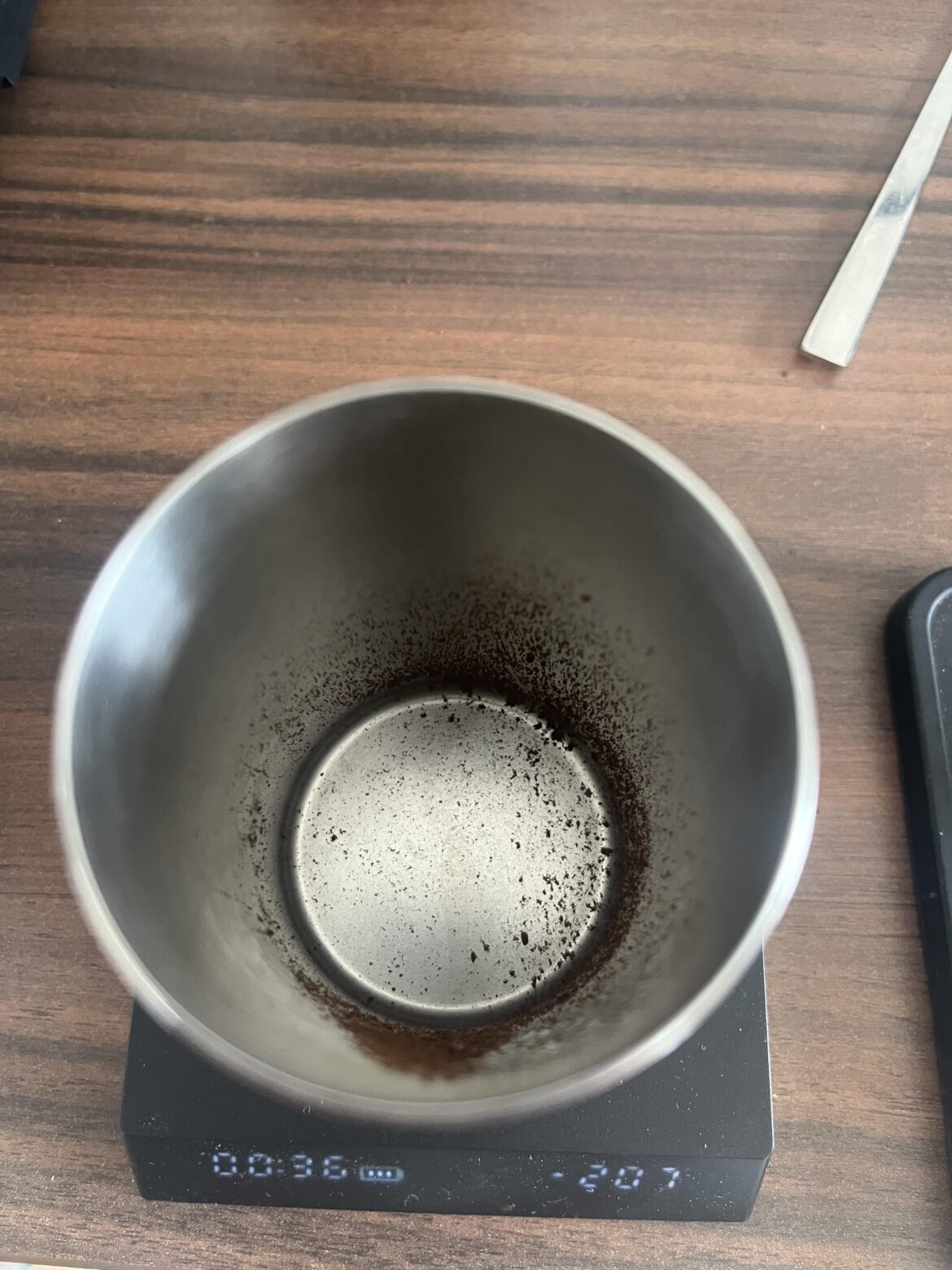 How do I avoid grounds sticking to the side of my dosing cup when RDT?