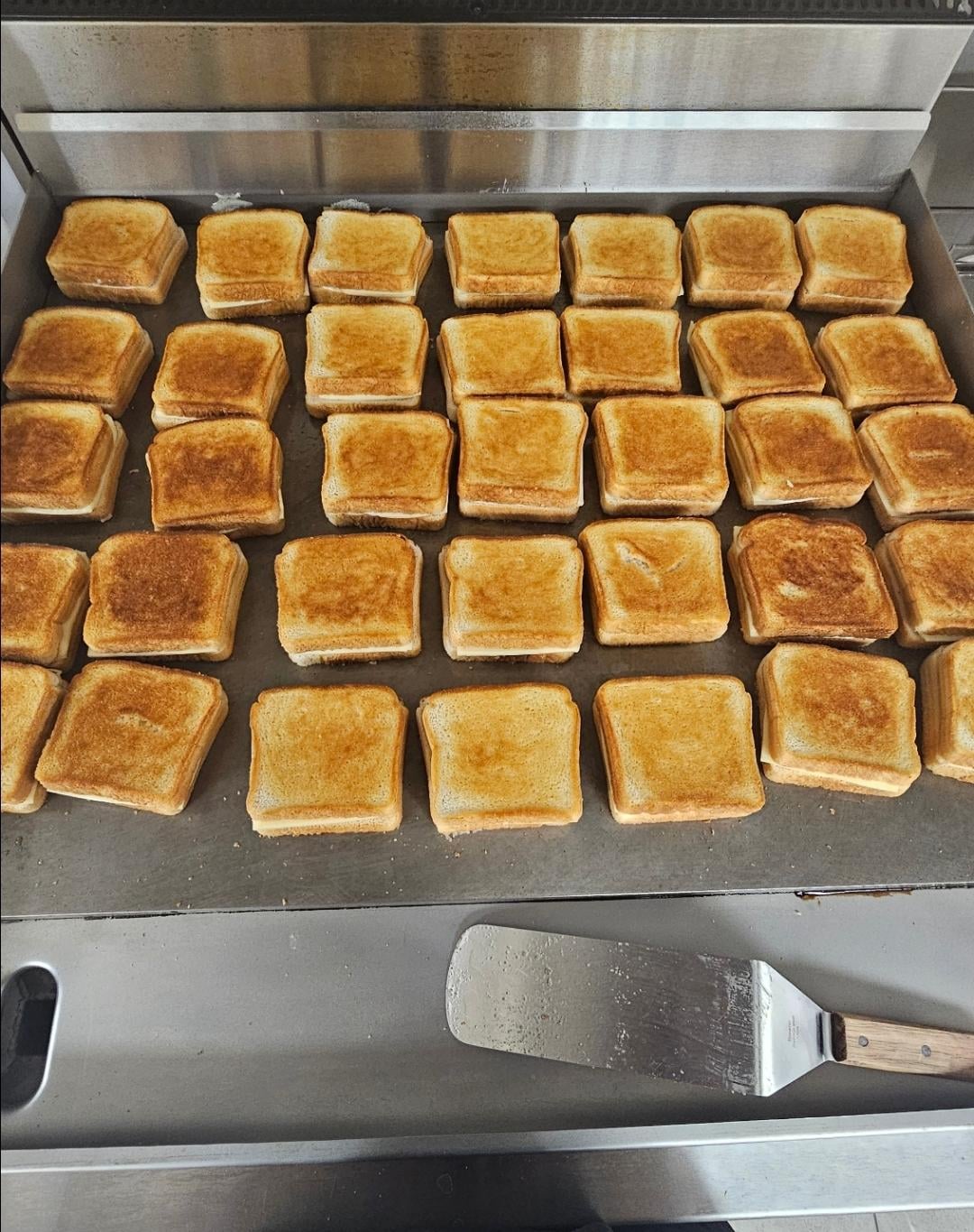 I made 100 grilled cheeses today Dining and Cooking