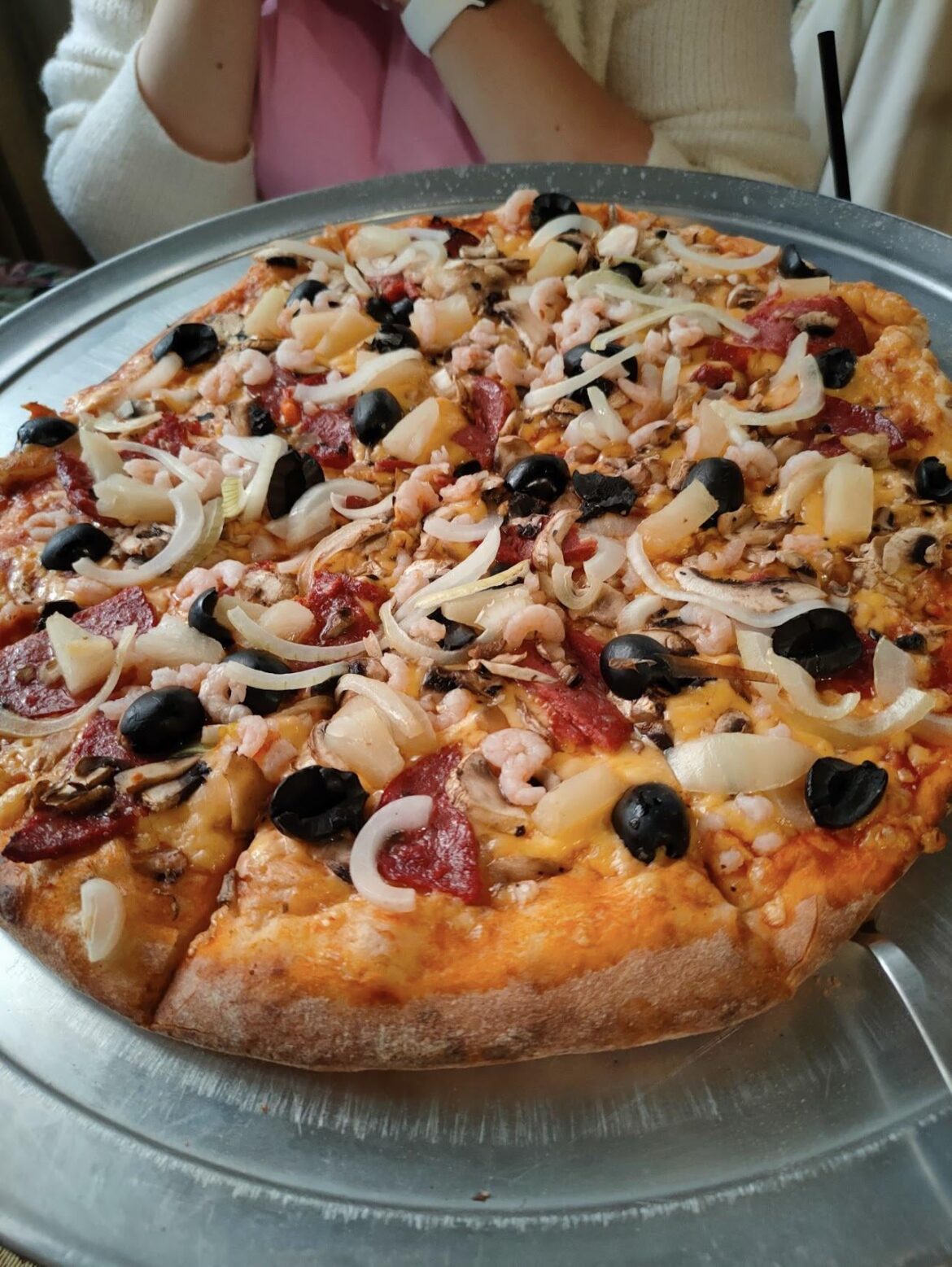 Local pizzeria in Kyiv offers a pizza with shrimps and pineapples