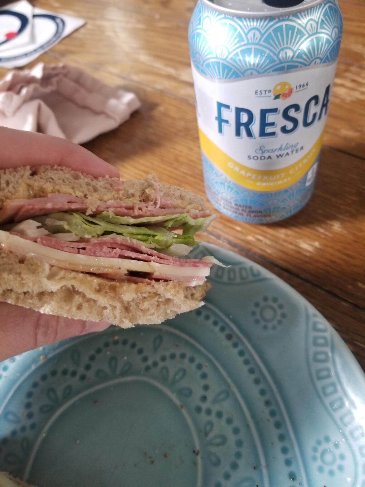 Ham, salami, provolone, lettuce, onion, mayo, and mustard on rye.  With a Fresca.
