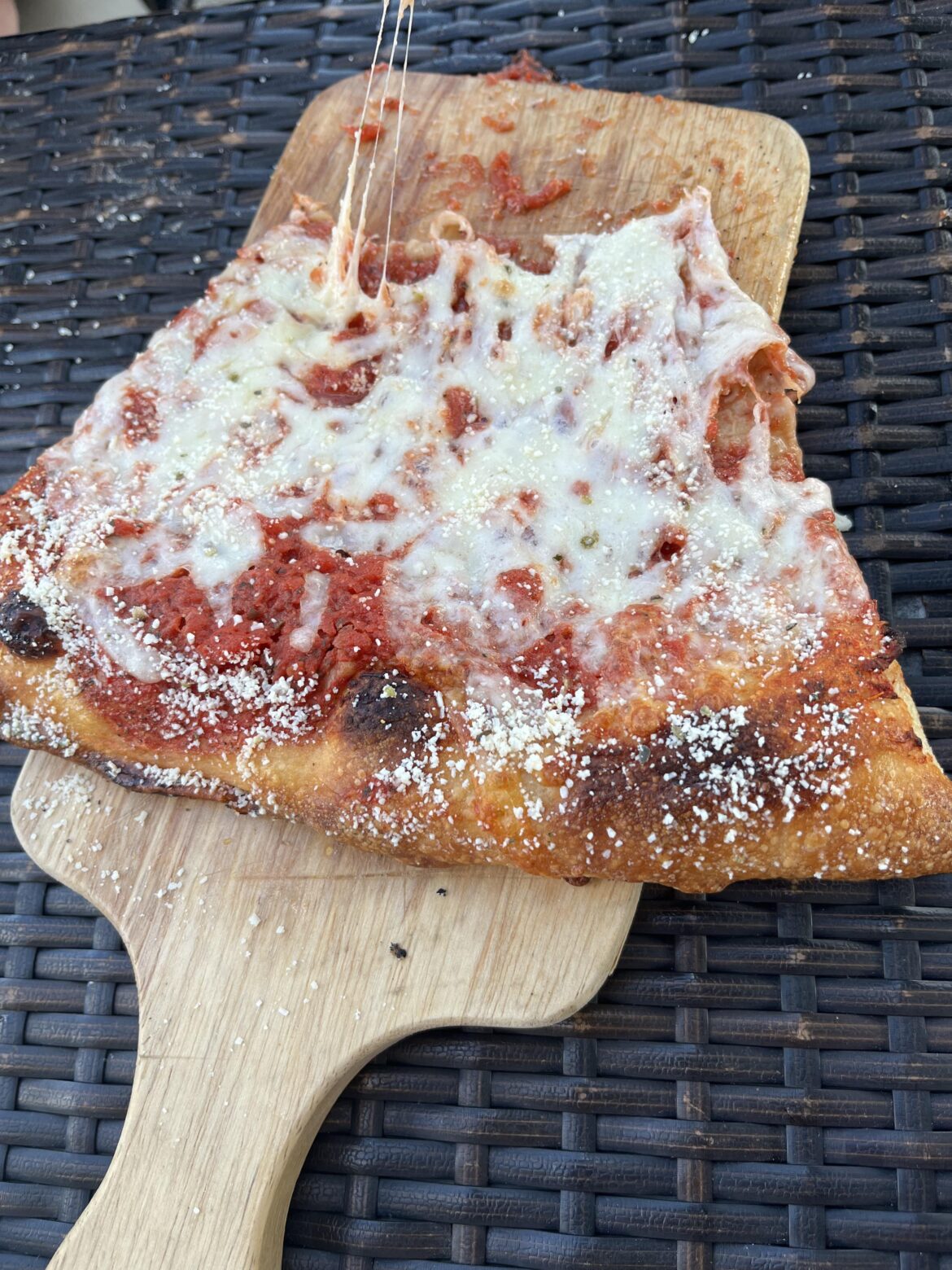 Pizza on a cutting board (pizza a was delicious though)