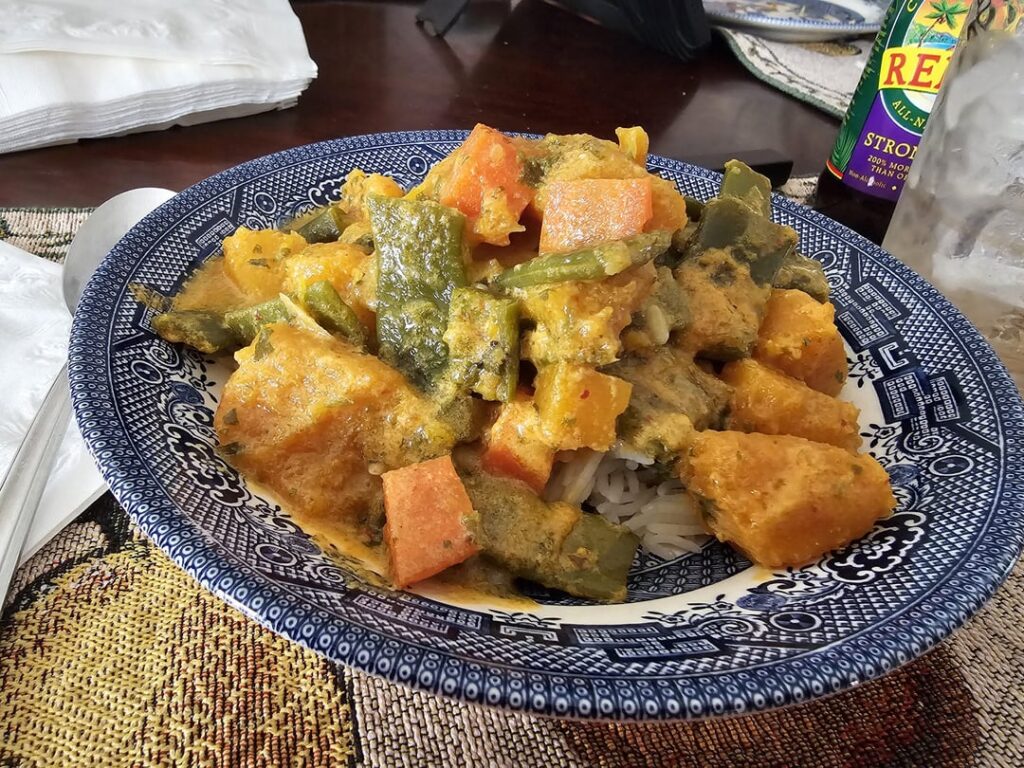 Summer Coconut Curry: Squash, pea pods, carrots, and chili pepper