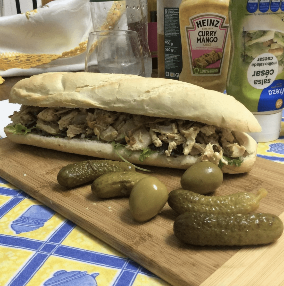 Dinner time with pickles and olives on the side. Canned Tuna Sub