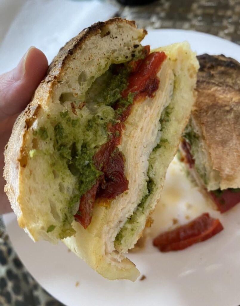 Turkey, pesto, and provolone, with roasted red peppers and sun dried tomatoes on a ciabatta roll for lunch