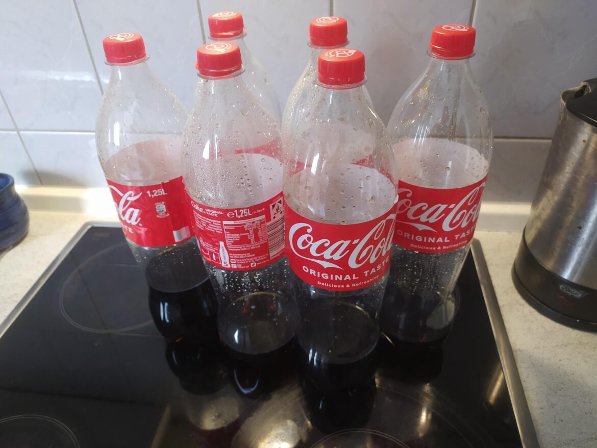 My SO never finishes her Coke bottles. Any ideas what I could use the leftover for?