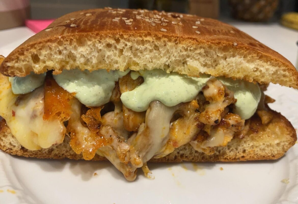 Harissa chicken, Oaxaca cheese, cilantro lime crema