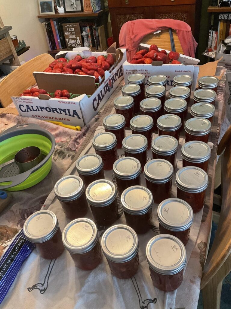 Weekend canning.  Peach jam and 32 jars of strawberry jam
