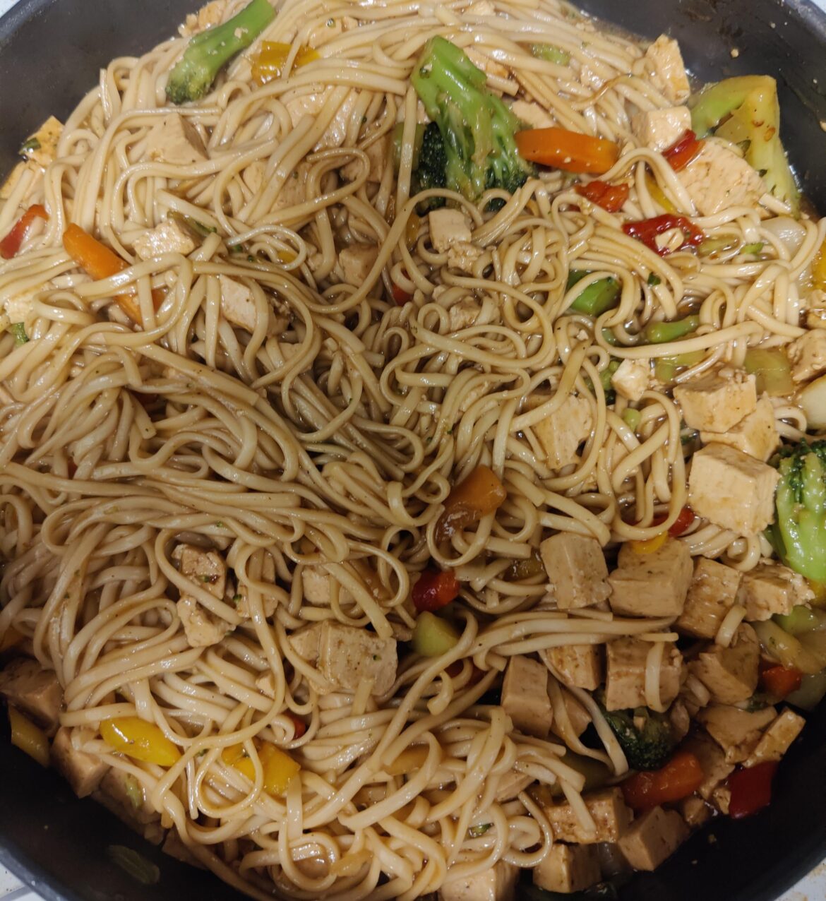 Kung Pao tofu with udon noodles and veggies