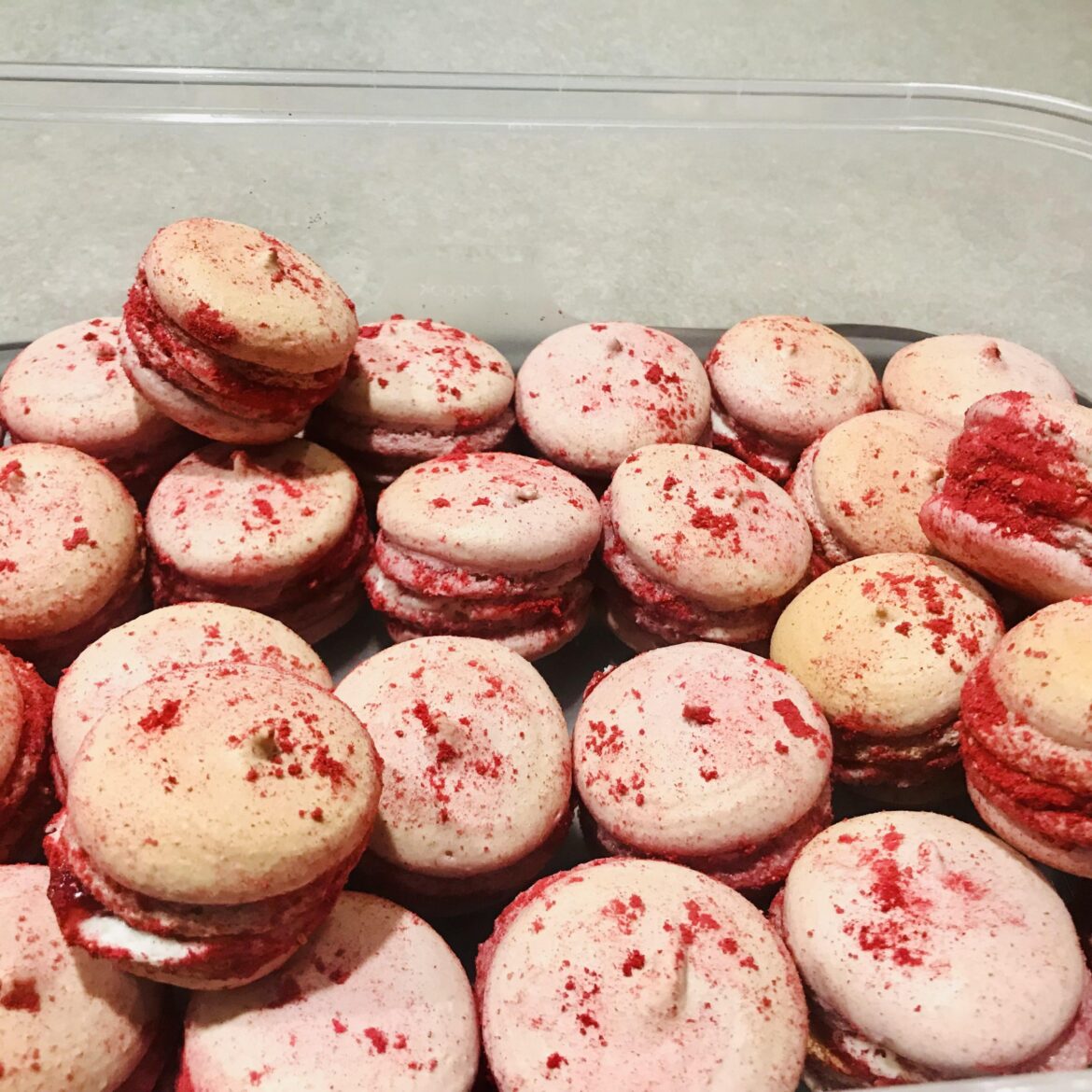 Second attempt high altitude. Raspberry shells, filled with cream cheese frosting and raspberry jam. I’m quite pleased :)