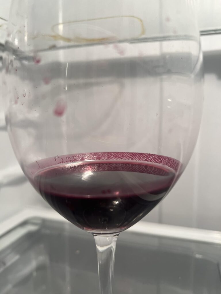What caused this pattern to form on the wine glass?