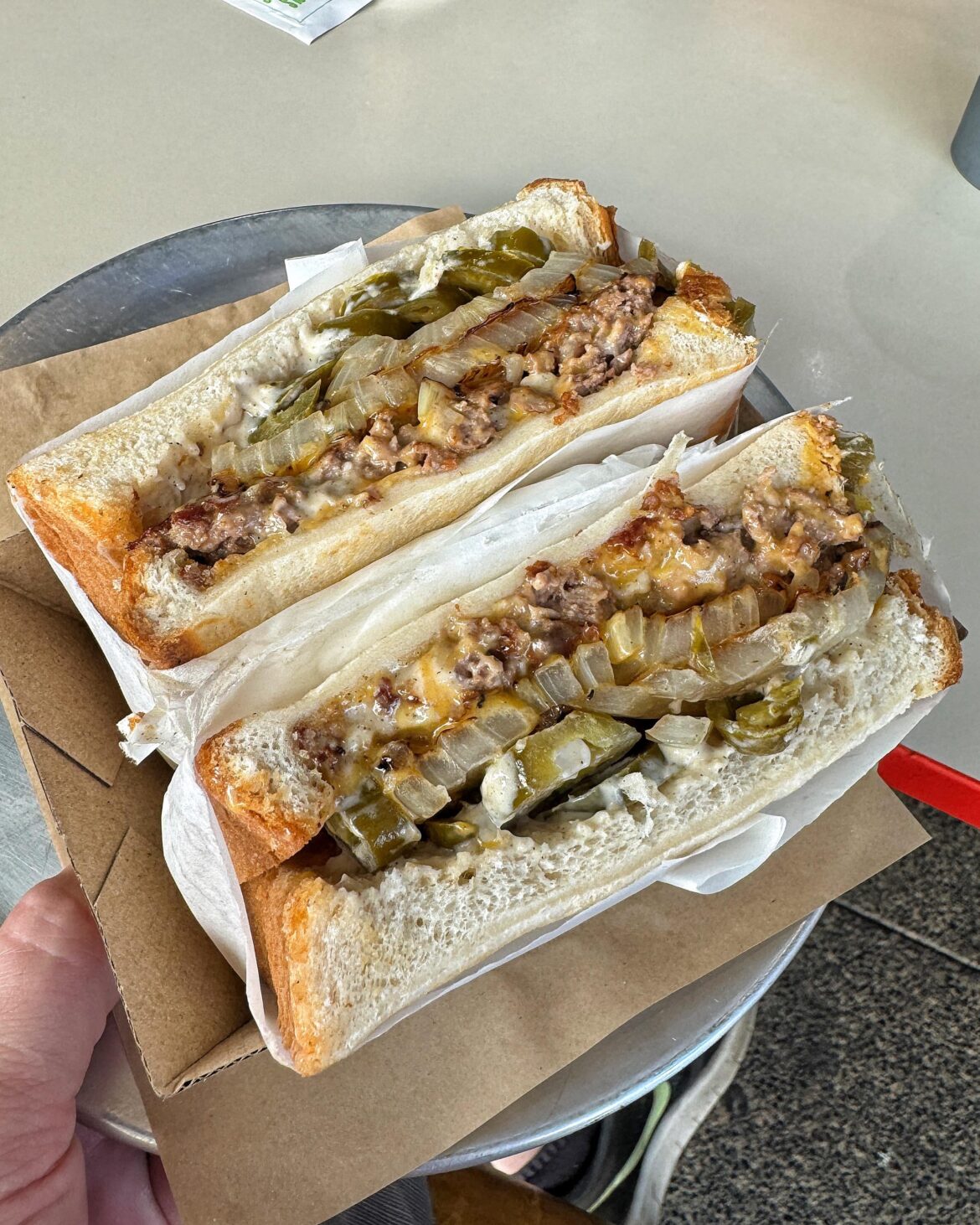 [I Ate] Patty melt. Cheese onions. White bread.