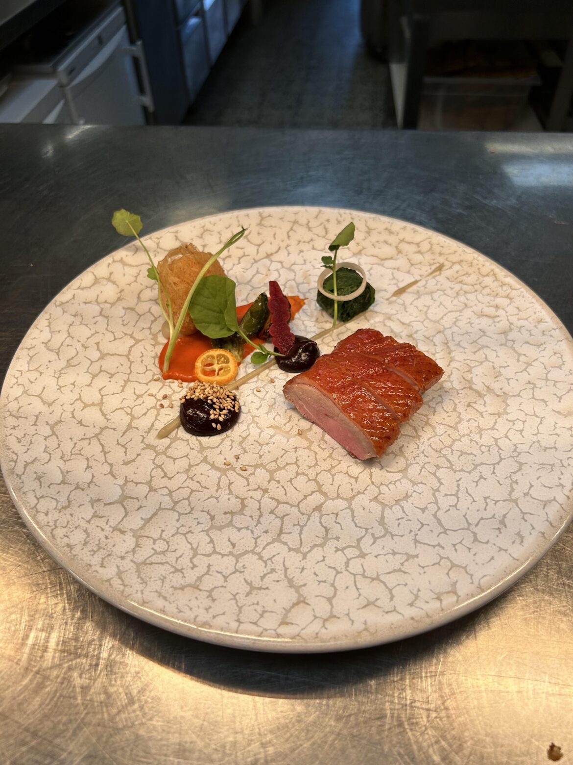 Peking duck, wu gok, spinach, peppers, hoisin