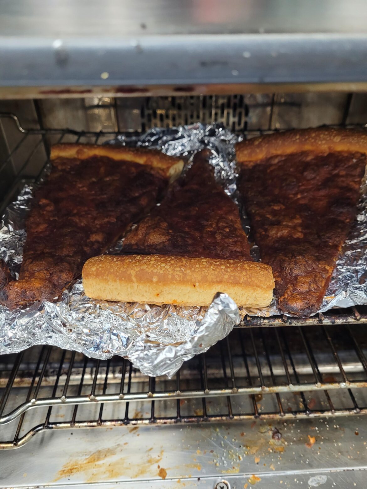 Taken at work. Not only was it burned, it was abandoned in the convection oven. Doubly burned and mistreated.