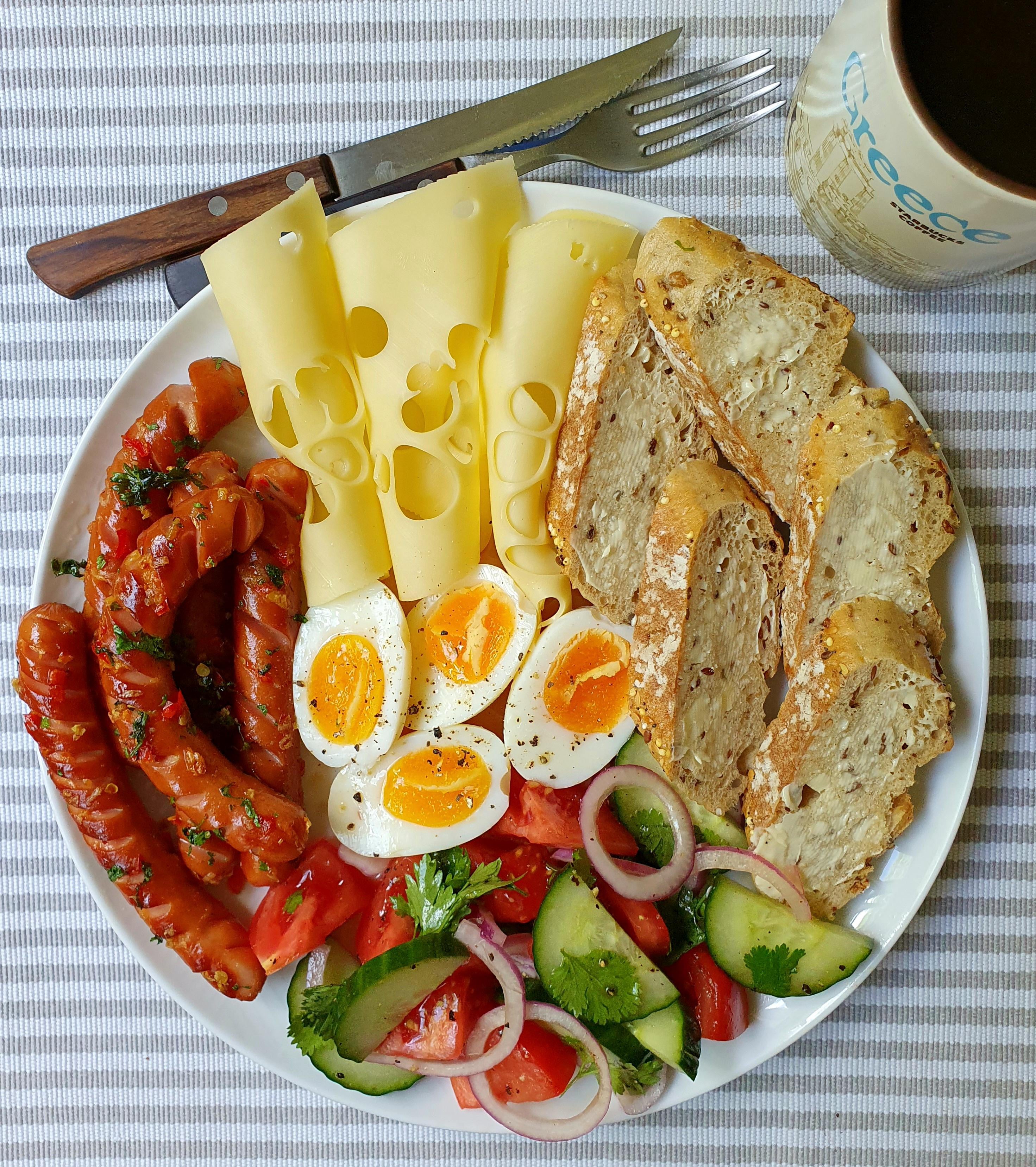 [I ate] Pan-fried frankfurters with soft boiled eggs, cheese and salad ...