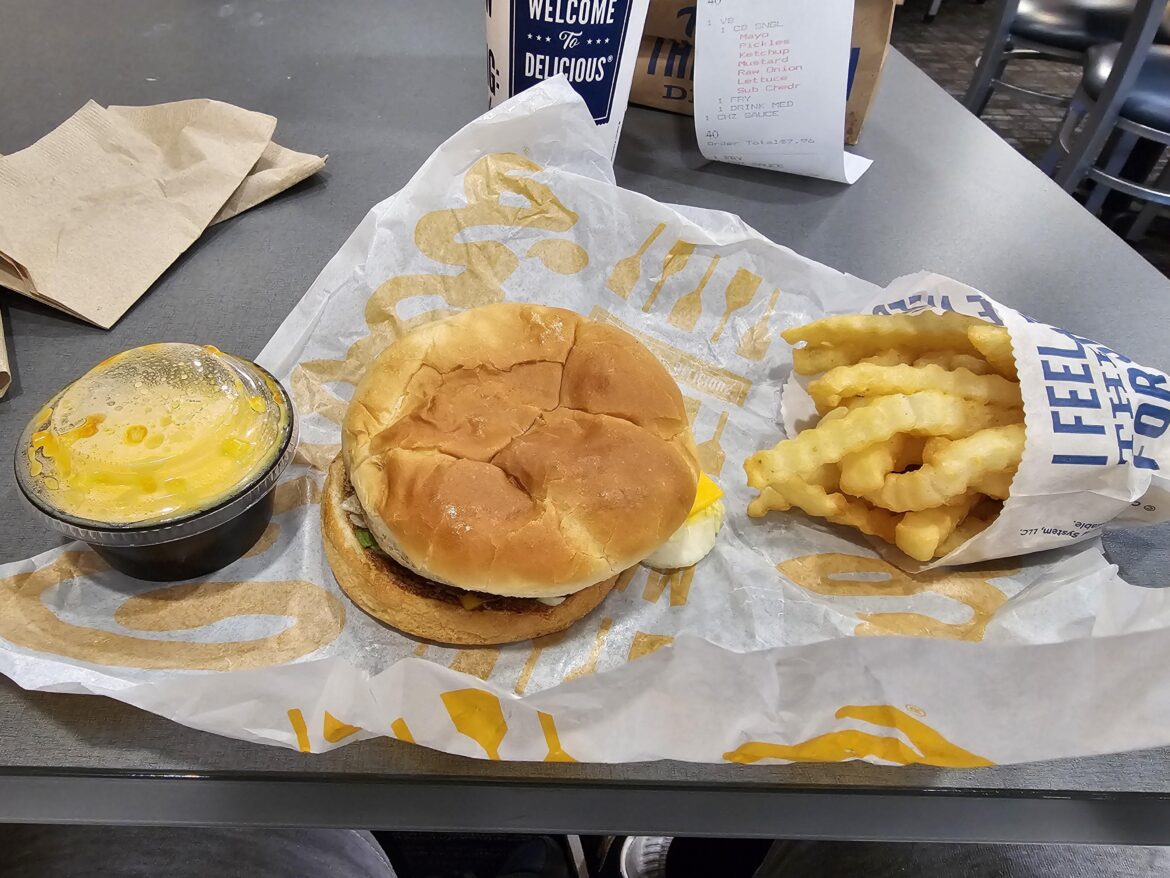 Culver's ButterBurger with cheese sauce and fries. Thank you whoever told me they had that on here.