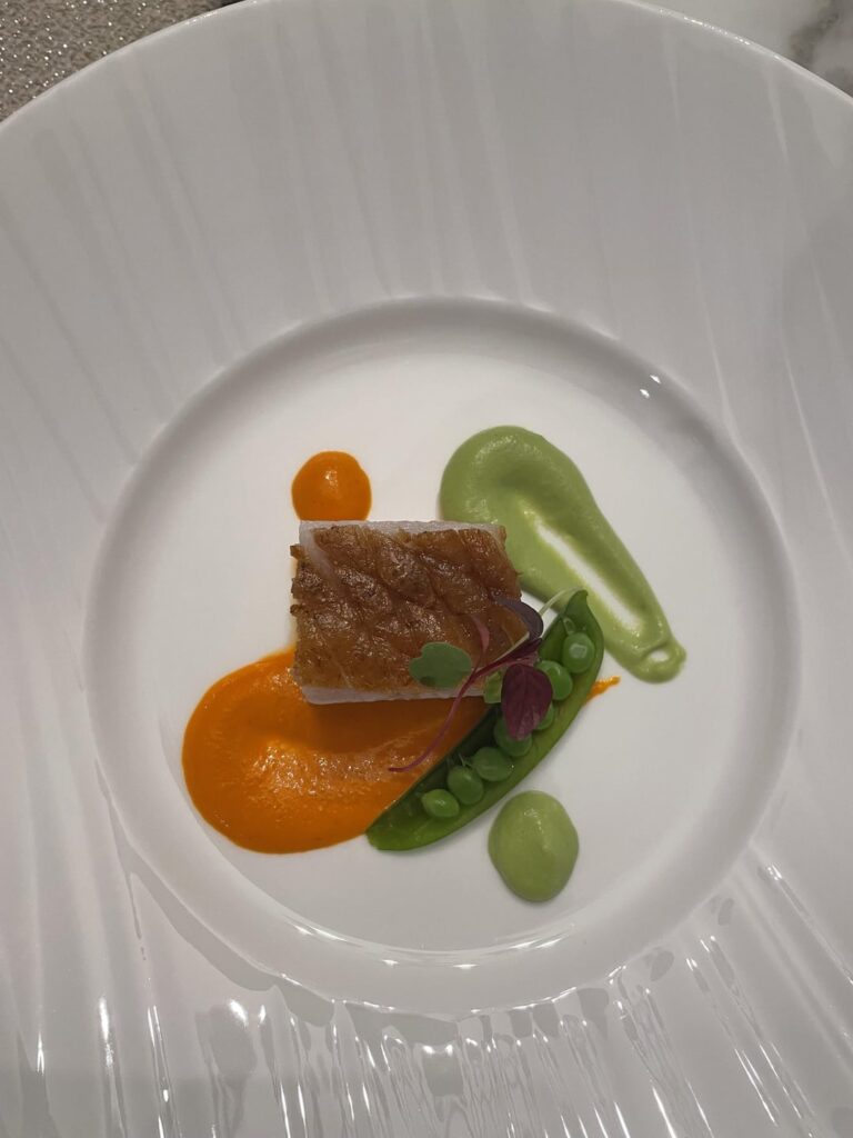 Reverse seared pork loin, snap pea and red pepper coulis