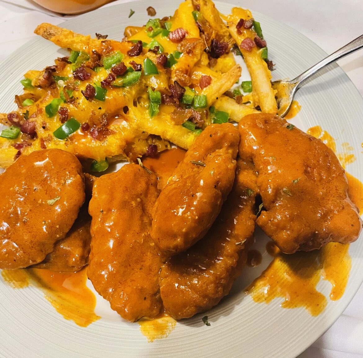 Buffalo chicken tenders & loaded fries.