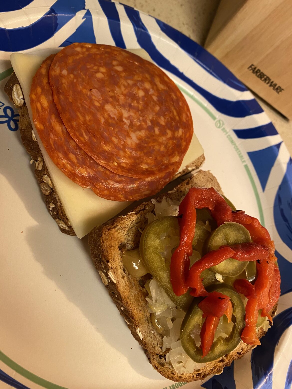 I call it the “Sweet & Sauer”. Pepperoni, mozzarella, roasted red pepper, pickled jalapeño and sauerkraut w/ honey mustard.