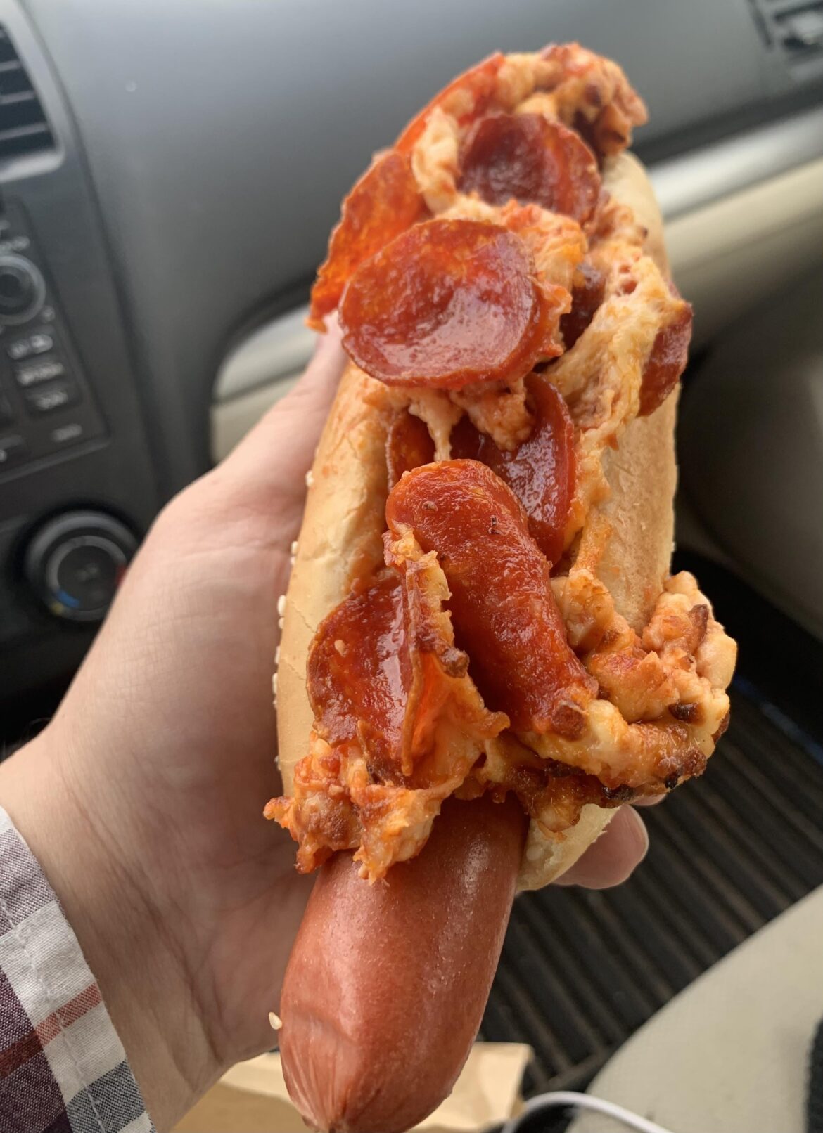 I skinned a slice of Costco pizza and draped it upon my Glizzy.