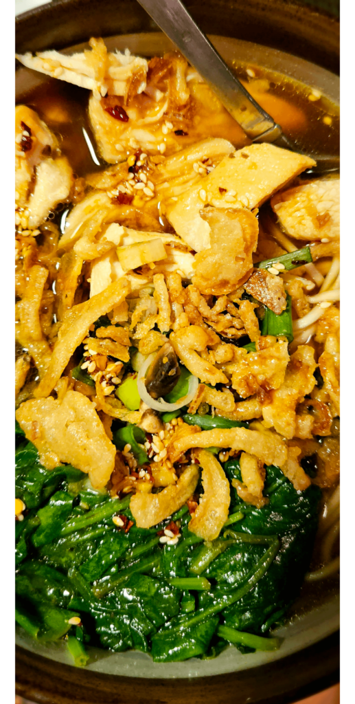 Chicken Ramen in a Shoyu-style broth with Mushrooms, chili garlic oil, & crispy onions!