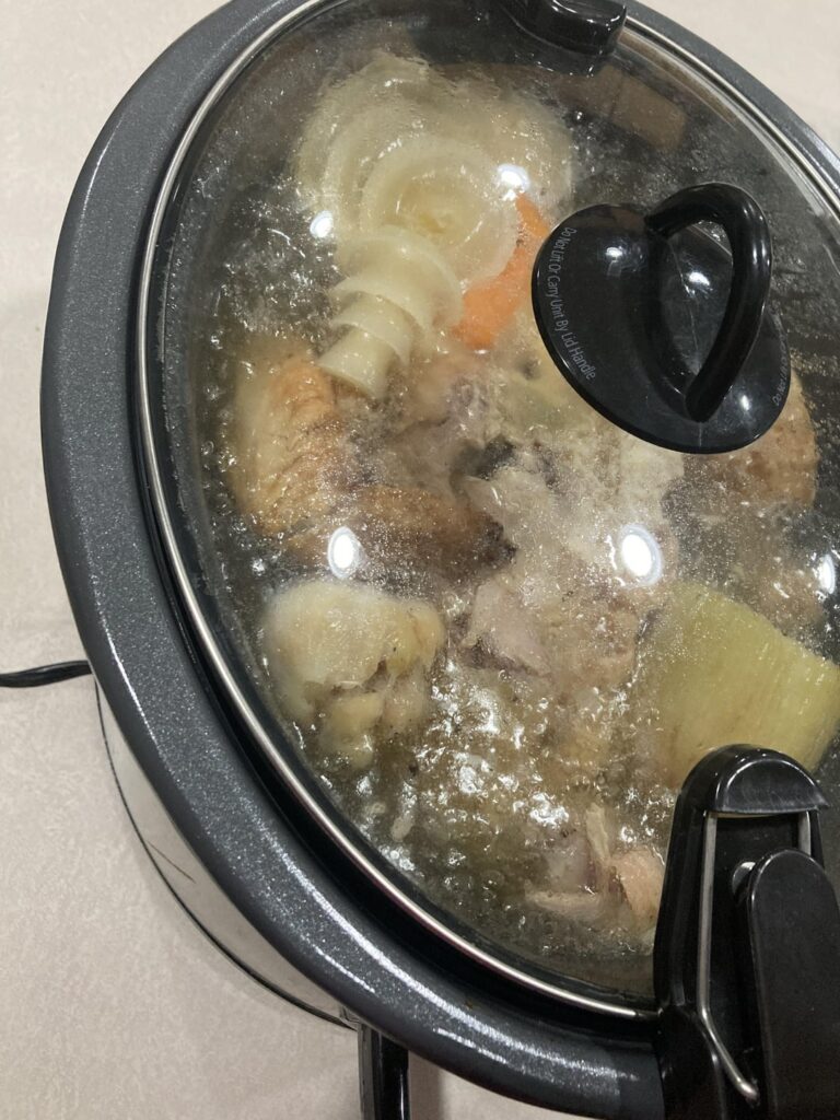 Running low on chicken broth. Costco chicken carcass to the rescue.