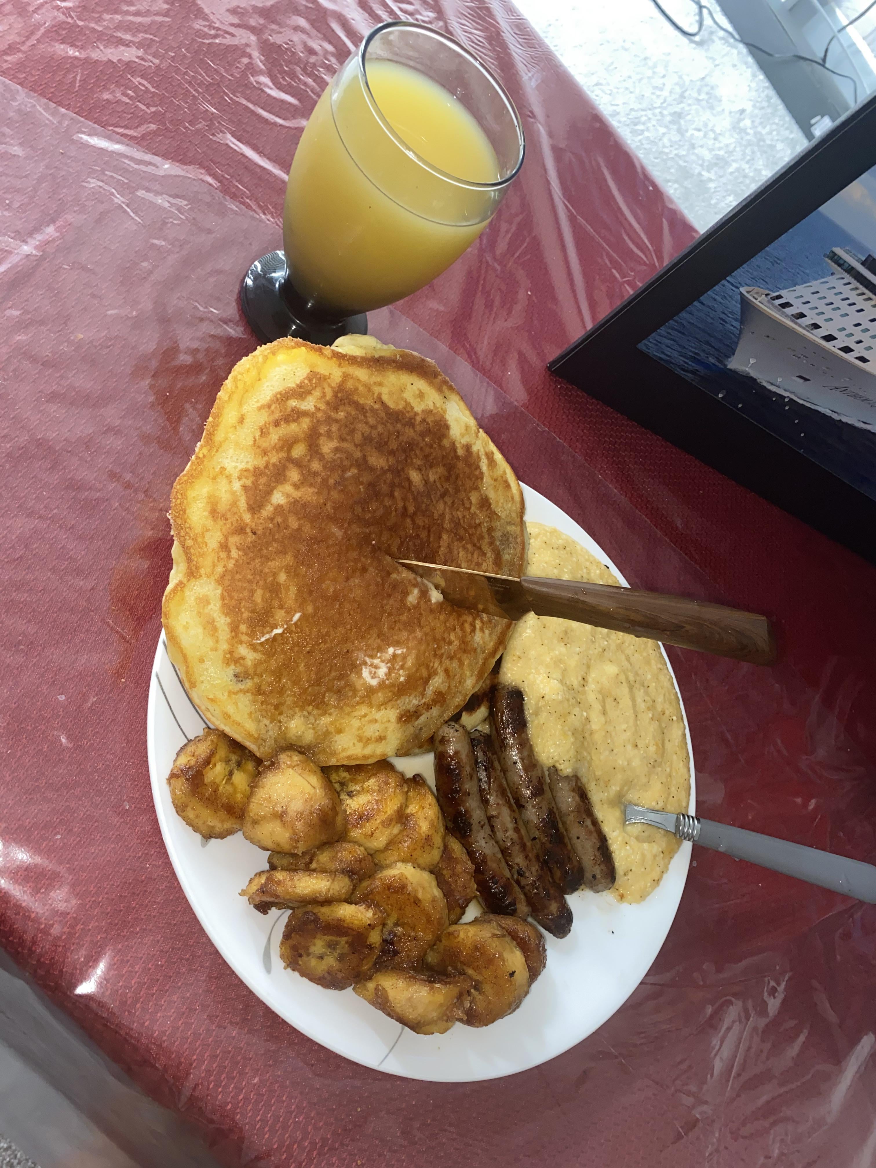 Pancakes sausage cheese grits plantains orange juice - Dining and Cooking